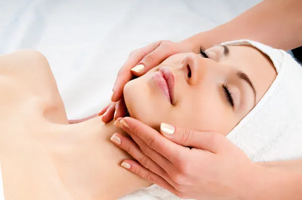 depositphotos_8329072-stock-photo-woman-receiving-facial-massage